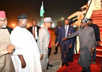 Tinubu returns from France, amidst protest on rising food and living costs